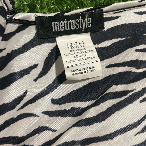 Sleeveless satin zebra striped blouse with rhinestone empire waist detail. - Picture 4 of 5